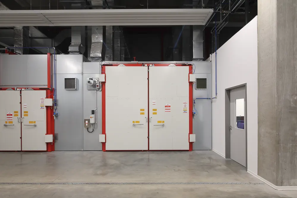 Double-leaf RF shielded doors set into the facade of a shielded room