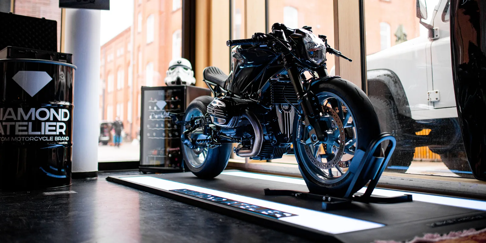A custom motorbike on a BikeThrone lit white